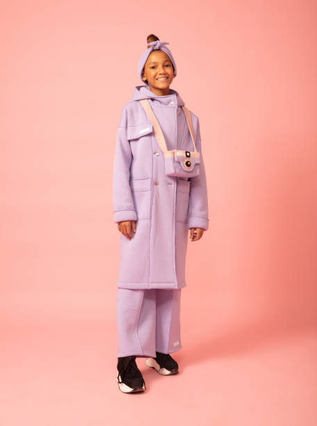 mixed-skinned little girl in casual dress. - fashion stock pictures, royalty-free photos & images
