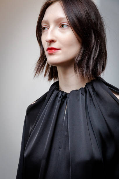 Model backstage ahead of the Eudon Choi show during London Fashion Week February 2023 on February 18, 2023 in London, England.