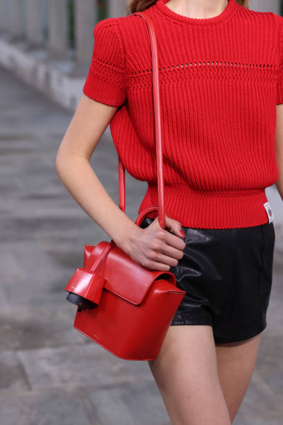 Model, bag detail, walks the runway at the Bally fashion show during the Milan Fashion Week Womenswear Spring/Summer 2024 on September 23, 2023 in...