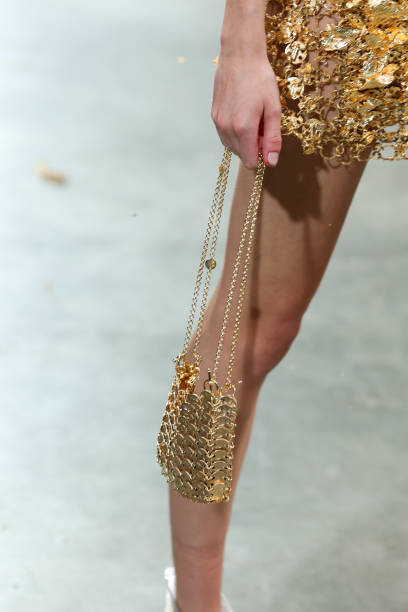 Model, bag detail, walks the runway during the Paco Rabanne Ready to Wear Spring/Summer 2025 fashion show as part of Paris Fashion Week on September...