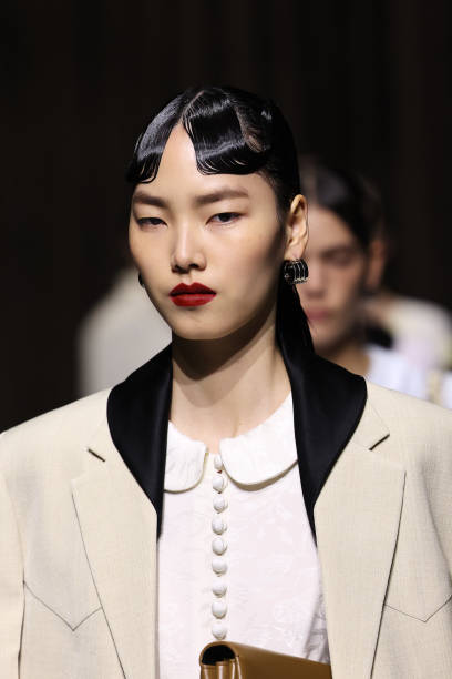 Model, beauty detail, walks the runway at the Jil Sander fashion show during the Milan Womenswear Spring/Summer 2025 on September 18, 2024 in Milan,...