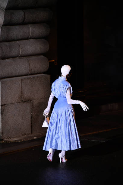 Model on the runway at Maison Margiela Couture Spring 2024 as part of Paris Couture Fashion Week held at Pont Alexandre III on January 25, 2024 in...