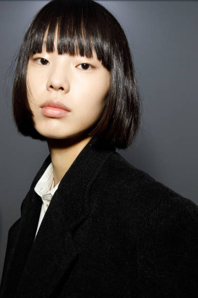 Model poses backstage at the Jil Sander fashion show during the Milan Fashion Week Womenswear Fall/Winter 2023/2024 on February 24, 2023 in Milan,...