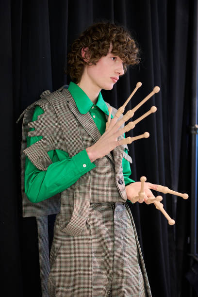 Model poses backstage prior to the Walter Van Beirendonck Menswear Fall-Winter 2025/2026 show as part of Paris Fashion Week on January 22, 2025 in...