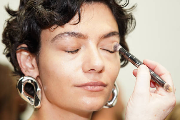 Model prepares backstage ahead of the Third Form show during Australian Fashion Week Presented By Pandora 2024 at Carriageworks on May 15, 2024 in...