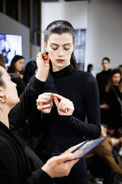 Model prepares backstage prior to the Atlein Womenswear Fall/Winter 2024-2025 show as part of Paris Fashion Week on March 03, 2024 in Paris, France.
