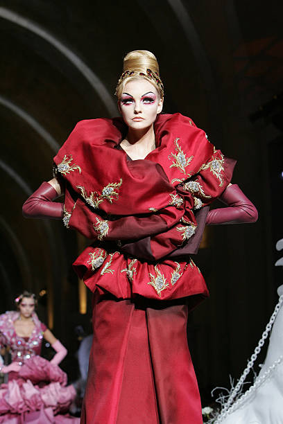 Model walks down the catwalk wearing Dior Haute Couture Fall/Winter 2008 on July 2 in Versailles, France.