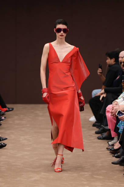 Model walks the runway at the Ferrari fashion show during the Milan Womenswear Spring/Summer 2025 on September 21, 2024 in Milan, Italy.