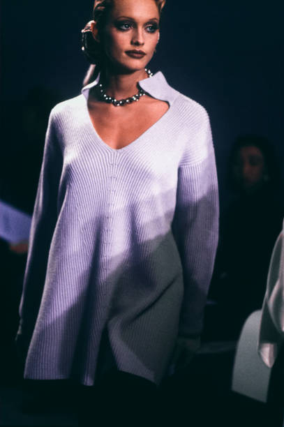 Model walks the runway at the Thierry Mugler Ready to Wear Fall/Winter 1993-1994 fashion show during the Paris Fashion Week in March, 1993 in Paris,...