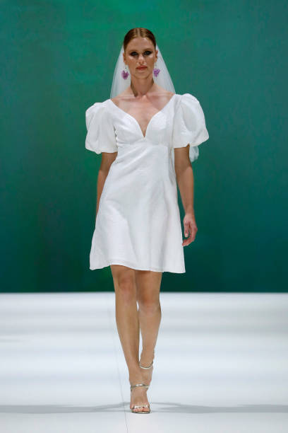 Model walks the runway during the Marylise-Rembo Styling-Carta Branca show as part of the Barcelona Bridal Week 2022 on April 21, 2022 in Barcelona,...