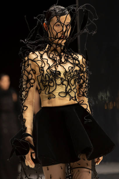 Model walks the runway during the Tima Abid show at Riyadh Fashion Week October 17, 2024 in Riyadh, Saudi Arabia.