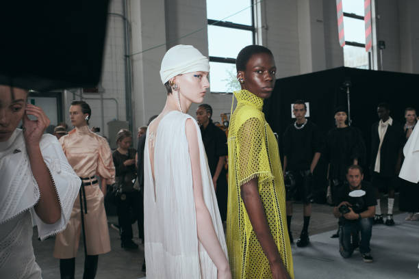 Models are seen backstage ahead of the Jil Sander fashion show during the Milan Fashion Week Womenswear Spring/Summer 2024 on September 23, 2023 in...