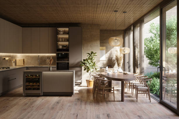 modern kitchen interior with cabinets, kitchen island, dining table, chairs and pendant lights - home decoration stock pictures, royalty-free photos & images