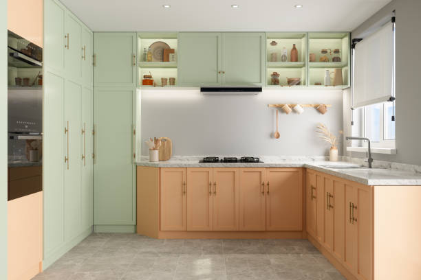 modern kitchen interior with pastel colored cabinets - home decoration stockfoto's en -beelden