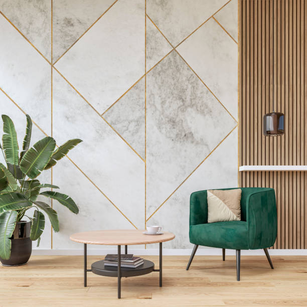 modern luxury interior: a living room with a soft green velvet armchair, low coffee table, marble white, golden and hardwood paneled wall background and decoration - home decoration stock pictures, royalty-free photos & image