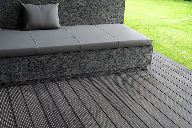 modern outdoor seating on textured deck - garden decoration stock pictures, royalty-free photos & images