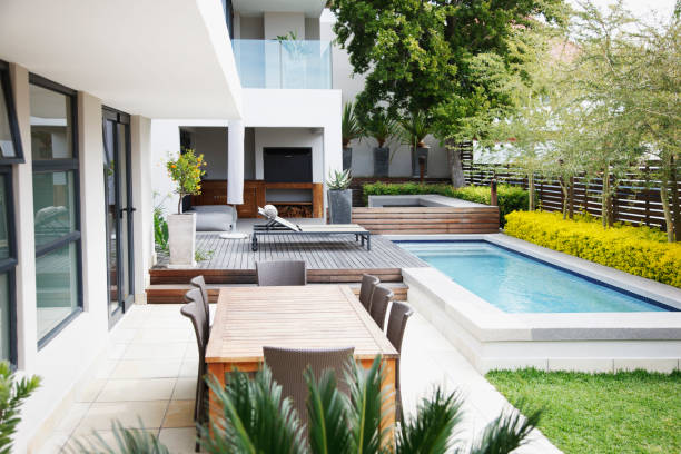 modern patio next to swimming pool - home decoration stock pictures, royalty-free photos & images