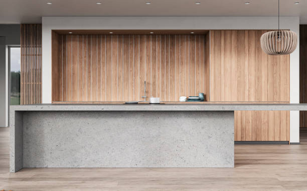 modern white kitchen with rectangular gray concrete breakfast kitchen island and counter top - garden decoration stock pictures, royalty-free photos & images