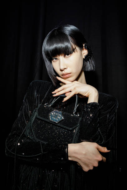 Moon poses backstage at the Philipp Plein fashion show during the Milan Fashion Week Womenswear Fall/Winter 2023/2024 on February 25, 2023 in Milan,...