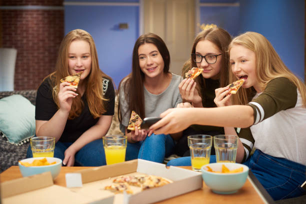 movie and pizza - junk food stock pictures, royalty-free photos & images