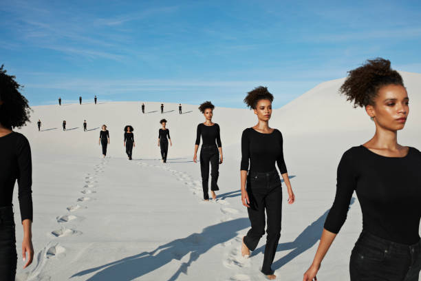 multiple image of young female models walking at desert - fashion stock pictures, royalty-free photos & images