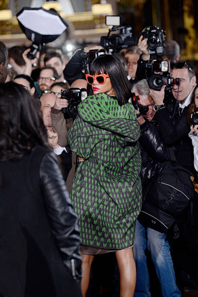 Music performer and singer Rihanna arrives at the Stella McCartney Autumn Winter 2014 fashion show during Paris Fashion Week on March 3, 2014 in...
