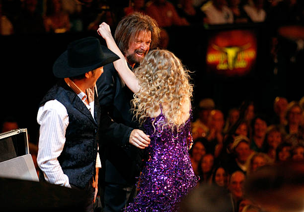 Musician Taylor Swift performs with Kix Brooks and Ronnie Dunn of Brooks & Dunn onstage during Brooks & Dunn's The Last Rodeo Show at MGM Grand...
