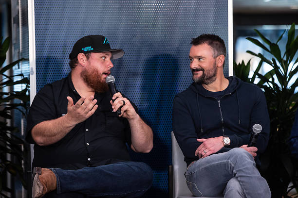 Musicians Luke Combs and Eric Church speak during a press conference for the Concert for Carolina at Bank of America Stadium on October 26, 2024 in...