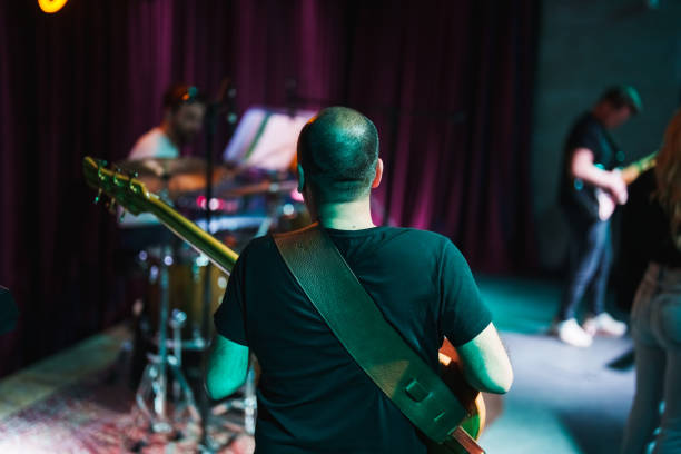 musicians on stage - concert stock pictures, royalty-free photos & images
