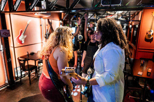 musicians playing and singing on a pub - concert stock pictures, royalty-free photos & images