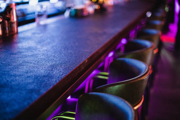 nightclub bar counter with blue and purple neon light - home decoration stockfoto's en -beelden
