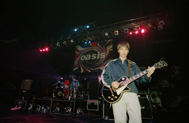 Noel Gallagher of British rock group Oasis live at the Astoria in London, 19th August 1994.