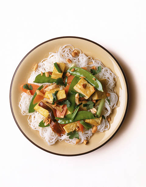 noodles with tofu and vegetables - food stock pictures, royalty-free photos & images