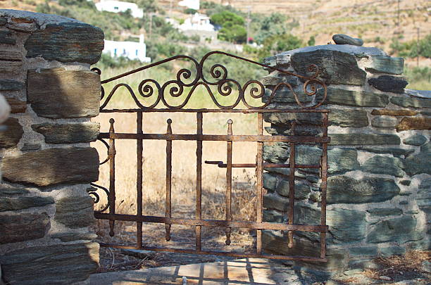 old iron gate in tinos island - garden decoration stock pictures, royalty-free photos & images