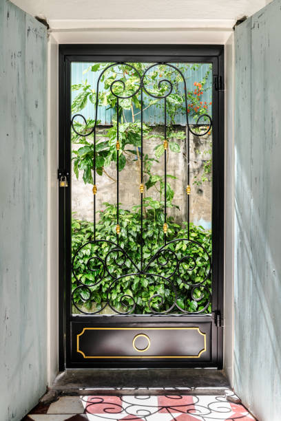 old retro style door with sunlight - garden decoration stock pictures, royalty-free photos & images