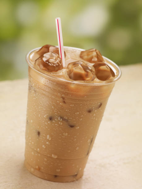 one glass of iced coffee - junk food stock pictures, royalty-free photos & images