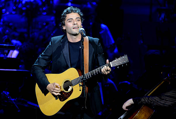 Oscar Isaac performs during the 25th Anniversary Rainforest Fund Benefit Concert at Carnegie Hall on April 17, 2014 in New York City.