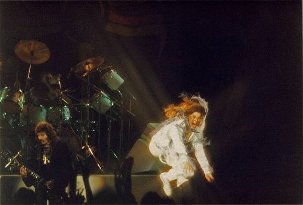 Ozzy Osbourne of Black Sabbath does his trademark 'leap' while performing on stage on the 'Never Say Die' tour, at Hammersmith Odeon on June 10th,...