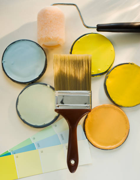 paintbrushes and assorted paints - home decoration stock pictures, royalty-free photos & images
