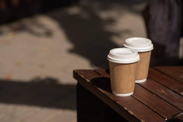paper coffee cup in coffee shop. - junk food stock pictures, royalty-free photos & images