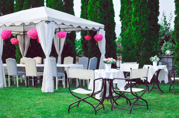 party tables in garden - garden decoration stock pictures, royalty-free photos & images