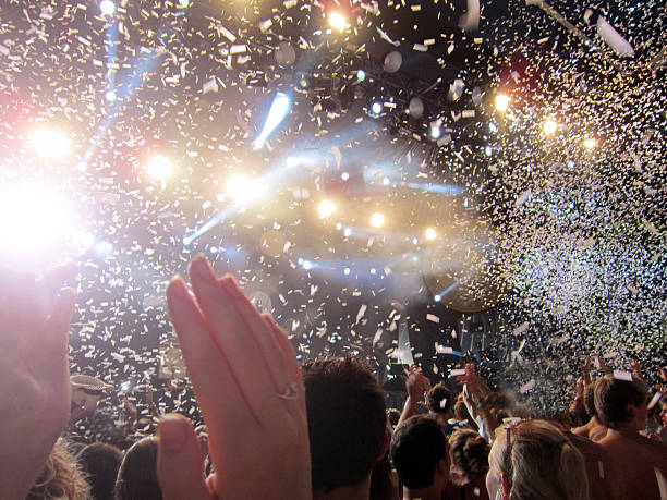 party time at a concert - concert stock pictures, royalty-free photos & images