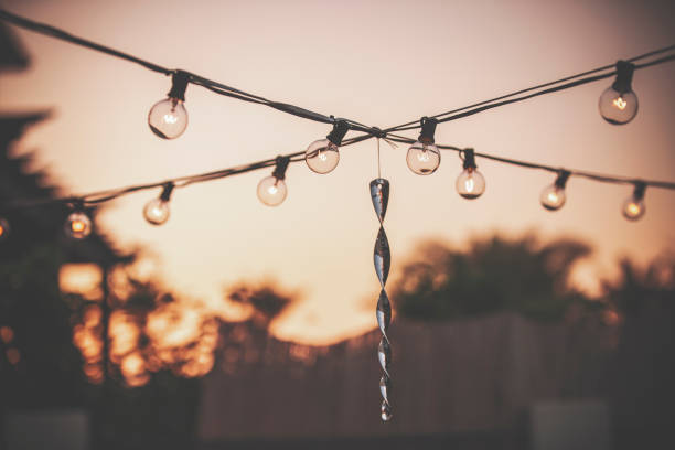patio string lights - garden decoration stock pictures, royalty-free photos & images