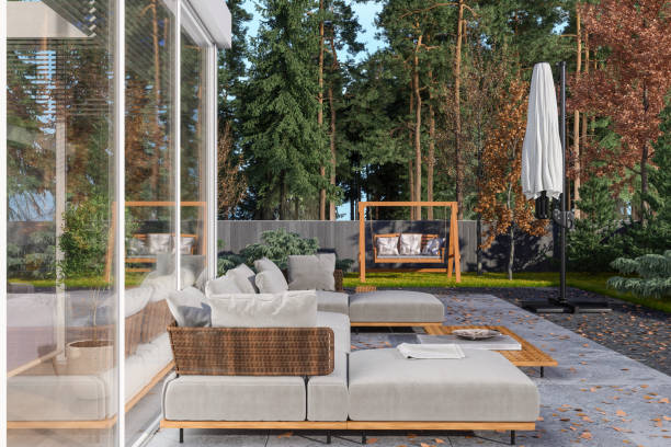 patio with corner sofa, coffee table and garden view - garden decoration stock pictures, royalty-free photos & images