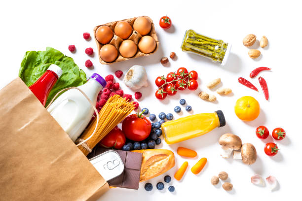 pepper bag full of groceries - food stock pictures, royalty-free photos & images