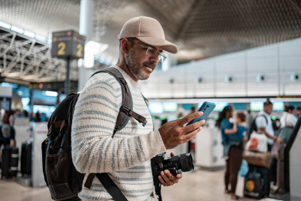 person at the airport to travel - travel stock pictures, royalty-free photos & images