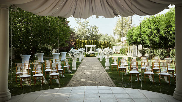photo of beautiful backyard wedding act decorations. - garden decoration stock pictures, royalty-free photos & images
