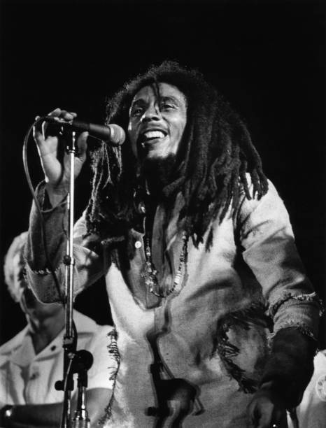 Photo of WAILERS and Bob MARLEY; Bob Marley performing live on stage at the One Love Peace concert at the National Stadium, Kingston
