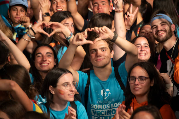 Pilgrims gather at Estoril Casino Gardens to celebrate with a rock concert on the eve of JMJ-WYD on July 31, 2023 in Estoril, Portugal. Lisbon hosts...