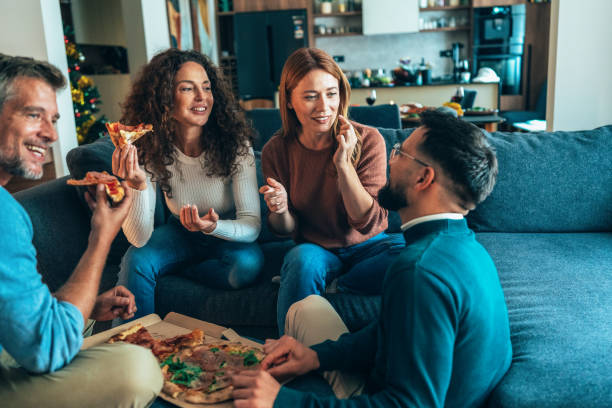 pizza and friends - junk food stock pictures, royalty-free photos & images